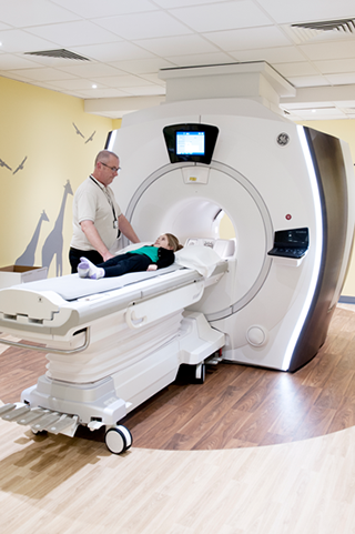 Photograph of a child having an MRI scan